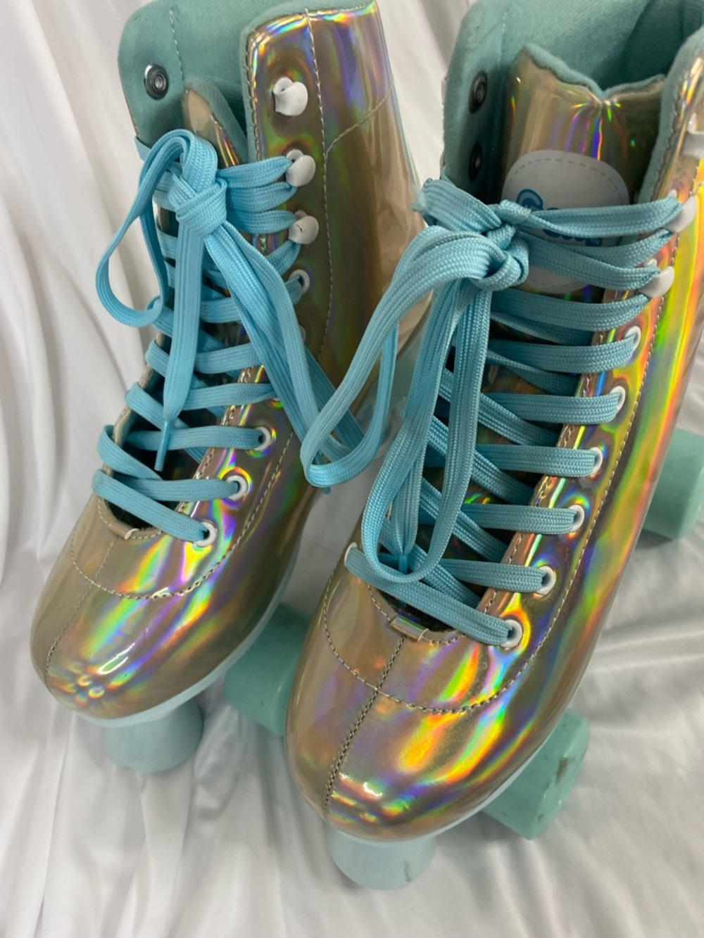 Holographic Roller Skates with Aqua Laces